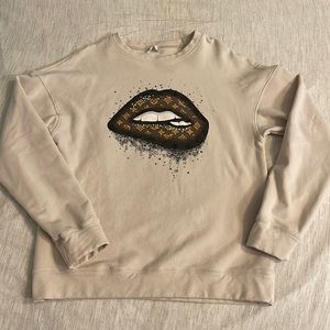 Medium size crewneck runs a little small